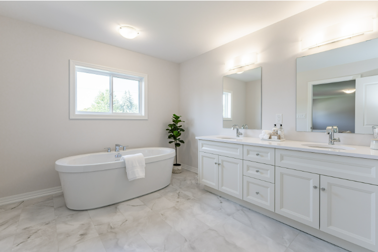 Meadow Heights master ensuite — soaker tub, double vanity, marble floors